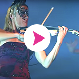 Sarah Mallock, electric LED violinist, performing for the Masquerade Ball, London