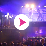 Sarah Mallock, electric LED violinist, performing Toss the Feathers 
accompanied by dancers